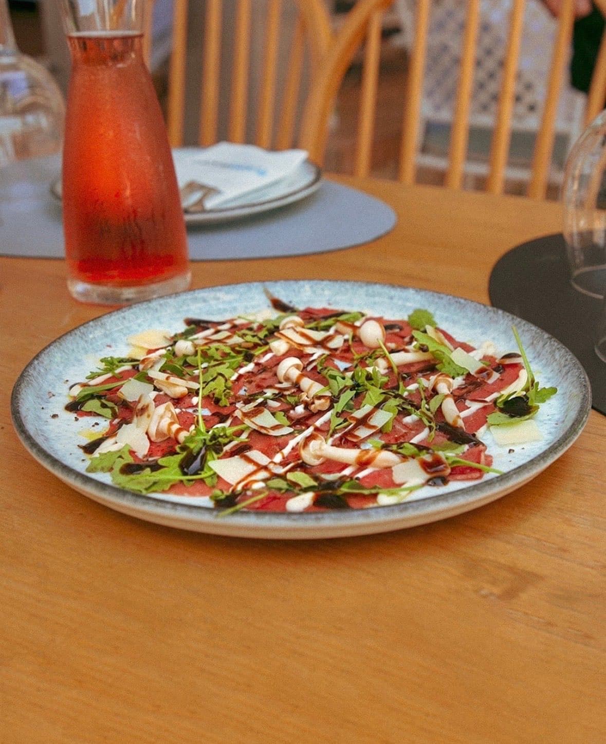 Beef carpaccio with rocket, parmesan and aged balsamic